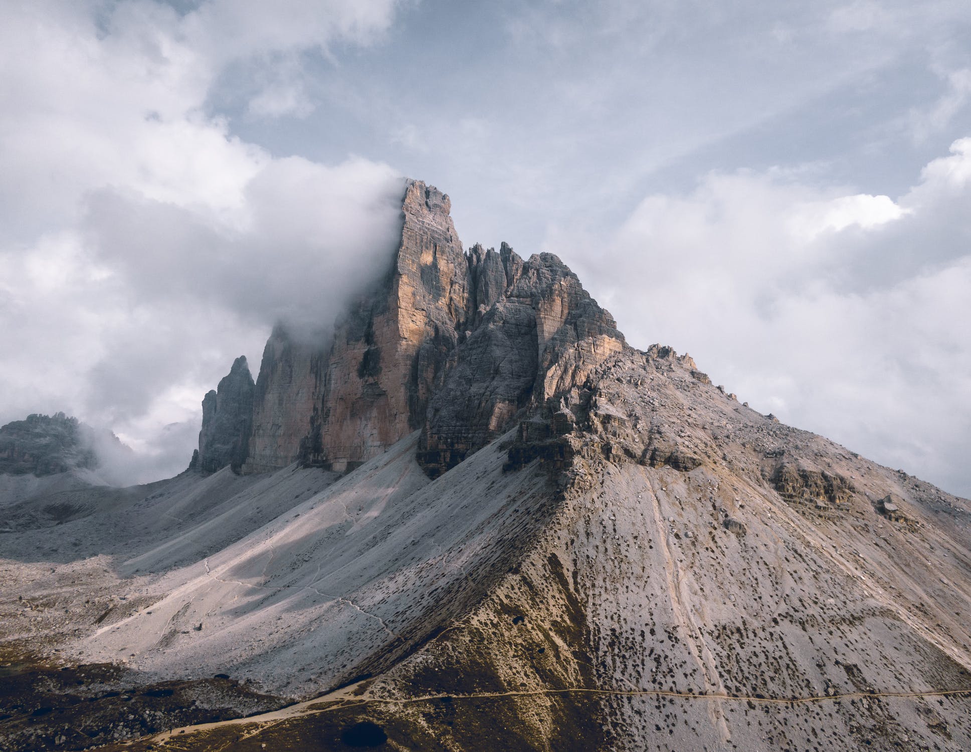 Jagged rock spires beneath heavy clouds